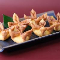 Crab Rangoon · 6 Pieces of mixed imitation crab and high-quality cream cheese wrapped with wonton skin. Ser...