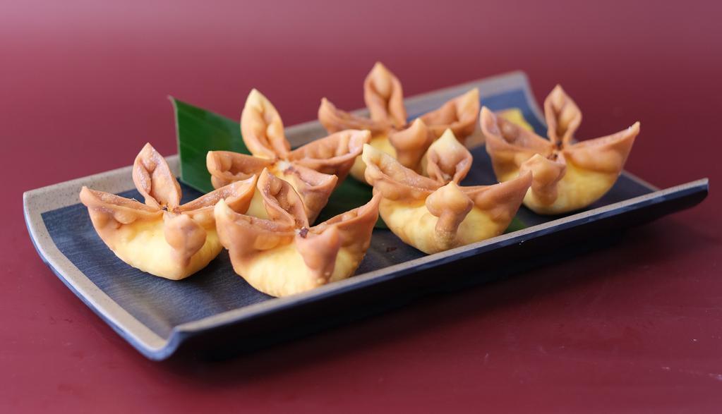 Crab Rangoon · 6 Pieces of mixed imitation crab and high-quality cream cheese wrapped with wonton skin. Served with ThaiDash's Sweet Sauce.