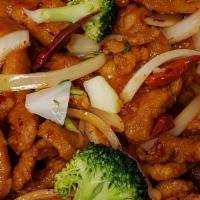 Orange Flavor Chicken · Hot and spicy. Tender fillet of marinated chicken delicately sautéed with imported orange pe...
