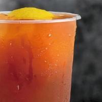 24Oz Honey Kumquat Fruit Tea / 金桔檸檬紅茶 · Honey kumquat syrup, fresh lemon, house brewed black tea.