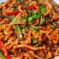 Sichuan Shredded Pork / 鱼香肉丝 · Bamboo shoots, black fungus, red and green bell peppers in a hot and spicy garlic sauce.