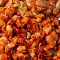 Kung Pao Chicken / 宫保鸡丁 · Diced chicken, roasted peanuts, chili peppers.