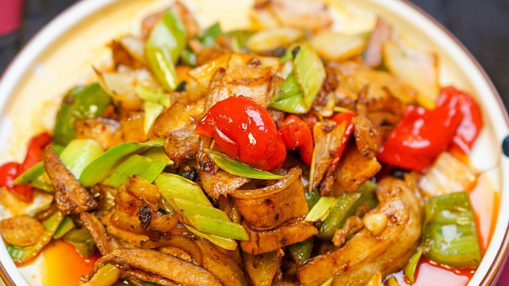 Twice Cooked Pork / 回锅肉 · Pork belly, leeks, onion, bell peppers in a spicy sweet bean paste.