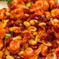 Kung Pao Prawns / 宫保虾球 · Spicy Sichuan chili sauce, peanuts, green onion, red chili peppers.