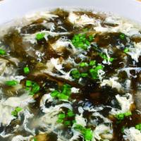 Seaweed & Egg Drop Soup 紫菜蛋花汤 · Egg drops, seaweed, chicken broth (contains dry shrimp)