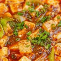 Chengdu Ma Po Tofu / 老成都麻婆豆腐 · Silken tofu, ground pork, leeks, spicy Sichuan peppercorn hot sauce.