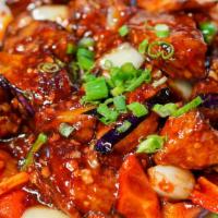 Sichuan Eggplant / 鱼香茄子 · Chinese eggplant, bell pepper, onion, Sichuan sweet chili glaze.