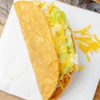Chicken Taco · Hardshell chicken taco with lettuce and cheese.