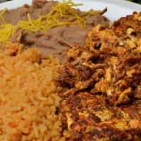 Chorizo Breakfast Platter · Served with 2 eggs, tortilla, rice, and beans.