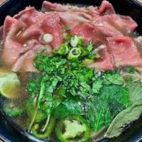Rare Steak · Thin sliced rare beef, house made broth, rice noodle, basil, sprouts, mint, lime, chili pepp...