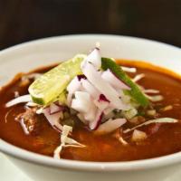 Pozole Rojo (Pork) Large · Traditional stew made from chilis guajillos, hominy and pork. Served with a side of onions, ...