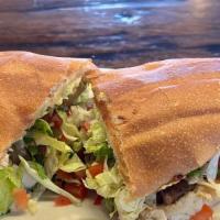 Torta Sandwich · Mexican bread filled with your choice of 
carne asada, carnitas, al pastor, chicken tinga or...