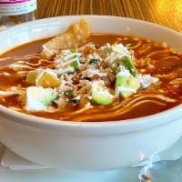 Sopa De Tortillas - Full · Smooth tomato and guajillo chile puree topped with crisp corn tortillas, pico de gallo, avoc...