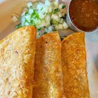 Birria Tacos · Braised beef inside a corn tortilla pan-fried in the juice from the birria meat. Topped with...