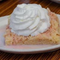 Tres Leches Cake · Handcrafted traditional Mexican cake topped with strawberry puree and whipped cream. Vegetar...