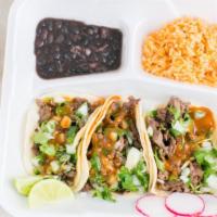 Street Taco Plate · Gluten free. Includes three soft tacos with four inch corn tortillas, your favorite choice o...