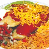 2 Tamales Plate · 2 chicken tamales smothered in salsa enchilada and cheese, pico de gallo, guacamole, sour cr...