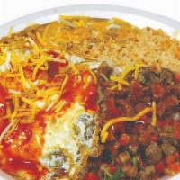 Steak Ranchero Breakfast Plate · Carne asada and pico de gallo topped with 2 fried eggs and salsa enchiladas, cheese, rice an...