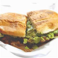 Super Torta · Carne asada, bacon and ham, 2 fried eggs, beans, guacamole, cheese, and lettuce.