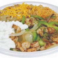Shrimp & Chicken · Shrimp, chicken, green bell peppers and onions, sour cream with rice and beans. 1 flour tort...