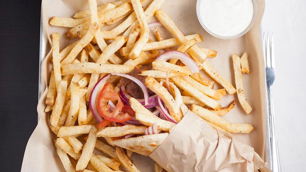 Old Country Gyro · Shaved gyro (beef lamb mix), tomatoes, red onions, french fries and tzatziki wrapped in grilled pita.