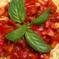 Espaguetis / Spaghettis · Rica combinación de nuestra deliciosa salsa de tomate, jamón, queso y pasta de espagueti. / ...