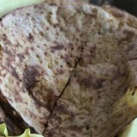 Aloo Paratha · (V) whole wheat bread stuffed with potatoes, peas, spices, vegetable oil, and salt baked in ...