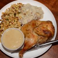 Oven Roasted Half Chicken · Oven roasted half chicken flavored with citrus, onion, garlic and paprika, with redskin bist...