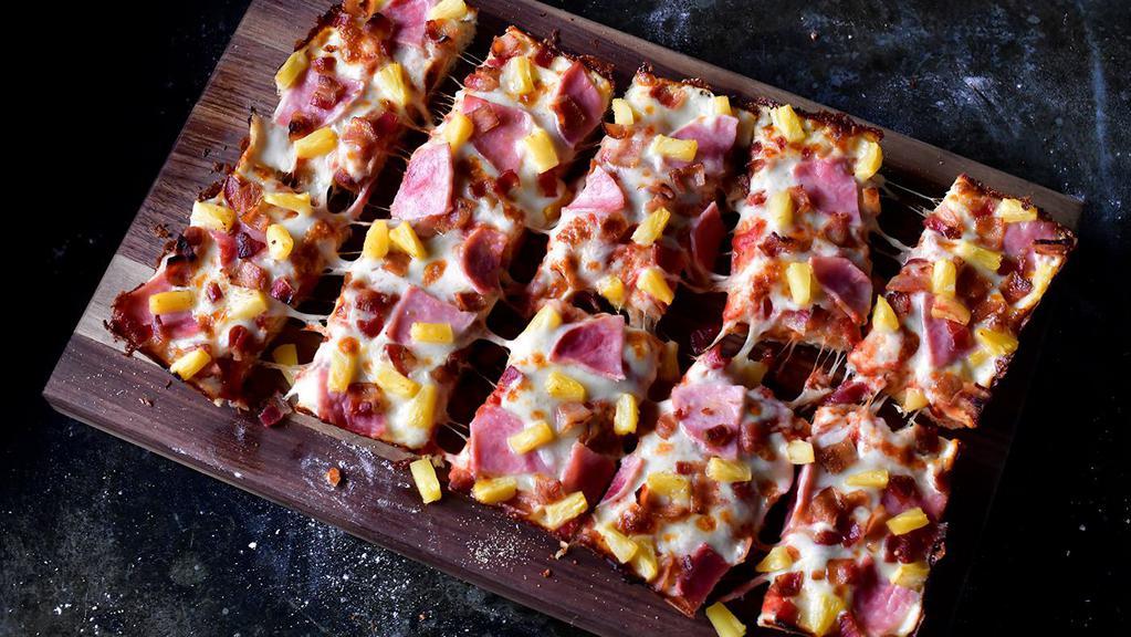 Hawaiian Pizza · Mozzarella cheese, ham, bacon, and pineapple.