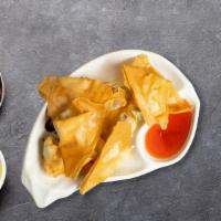 Crab Rangoon · (6 pieces) Golden fried wontons stuffed with cream cheese and crab meat Served with sweet an...