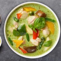 Green Curry · Coconut milk curry with zucchini broccoli bamboo shoots, green bean, bell pepper, and basil.