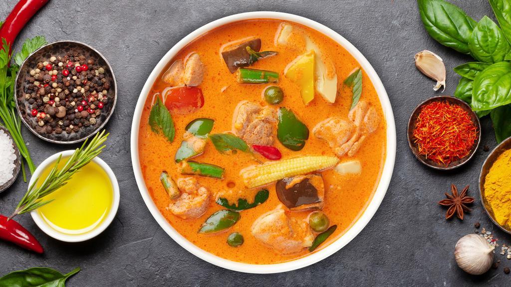 Panang Curry · Coconut milk red curry with green beans, bell pepper, and basil.