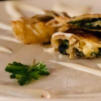 The Greek Pierogi (Spinach & Feta) · Welcome to Italia! Just kidding. We're Polish, but this delicately prepared Spinach & Feta p...
