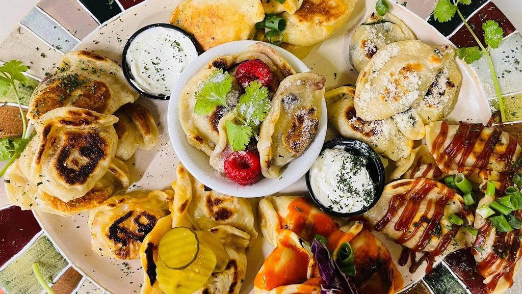 Couples Sampler · Our Couples Sampler feeds 2-3 and gives you a variety of our seven different flavors! Comes with 4 of each totaling in 28 Pierogi dumplings.