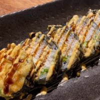Las Vegas Roll · A deep fried roll with fresh eel, cream cheese, avocado and crab mix, topped with Eel sauce ...