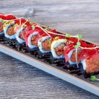 Tuna Lover Roll · Spicy tuna and cucumber inside, fresh tuna and topped with tobiko and eel sauce. If you are ...