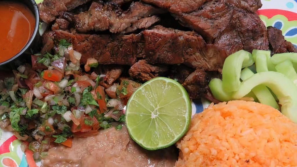Plate · Choice of meat, rice and beans, tortillas.