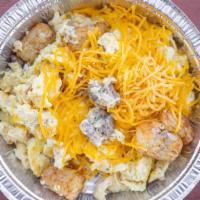 Breakfast Egg Bowl · Fresh eggs, scrambled together with thick cut bacon or sausage and tator-tots topped with ch...