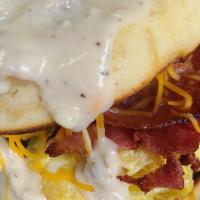 Flapjacks Bacon Breakfast Sandwich With Sausage And Bacon Gravy · 2 mini original flapjack stuffed with an egg 2 slices bacon or sausage patty, melted cheese,...
