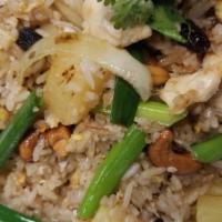 Pineapple Fried Rice · House fried rice with pineapple, cashews, scallions, and raisins garnished with cilantro.