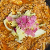 Cochinita Pibil Bowl · Slow cooked pork loin and leg marinated in achiote. Served with pickled red onion and five c...