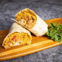 Butter Chicken Burrito · Butter chicken served wrapped in a warm tortilla rice, channa masala, dal, diced tomatoes & ...