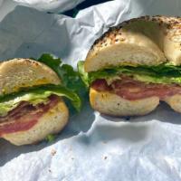 L.T · Toasted bagel with Bacon, lettuce. Tomato, Mayo&mustard.