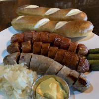 Game Sausage Platter · Buffalo, elk w/ jalapeño cheddar, wild boar. Comes w/ sauerkraut, 4 french pickle cornichon,...