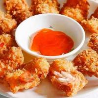 Tôm Chiên Bột · Deep-fried shrimp served with sweet and sour sauce.