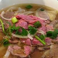 Phở Đặc Biệt · Dalat special combination beef noodle soup (top round steak, flank, lean brisket, tendon, tr...