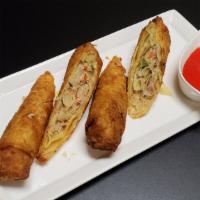 Egg Rolls · Two pieces.