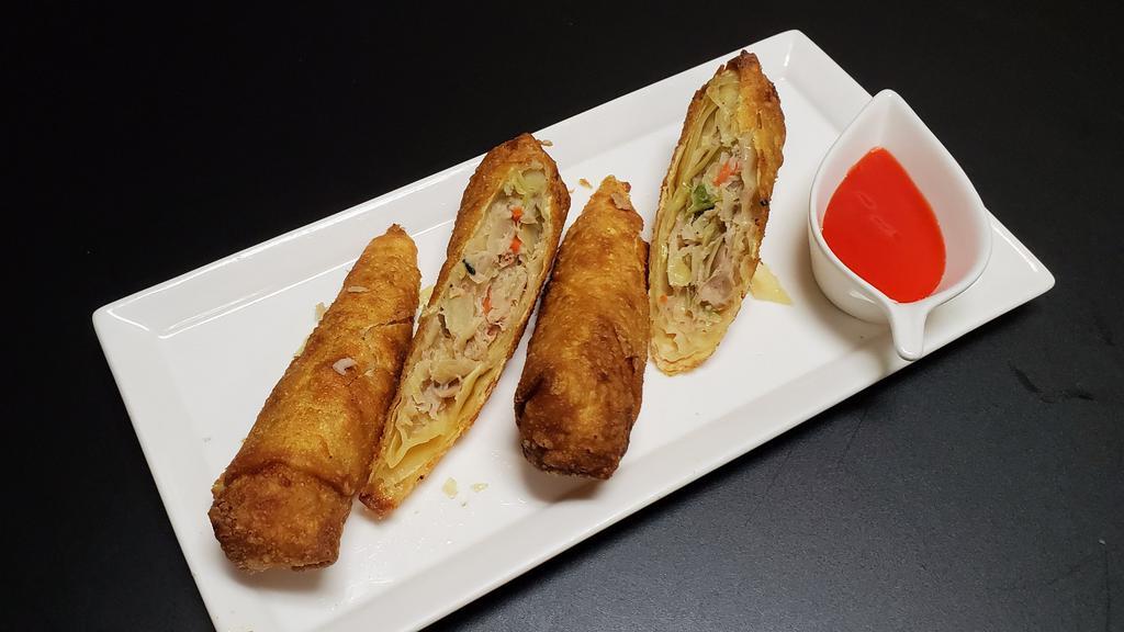 Egg Rolls · Two pieces.
