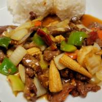 Garlic Beef · Served with steamed rice.