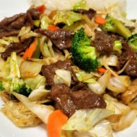 Stir-Fried Vegetables With Beef · Served with steamed rice.